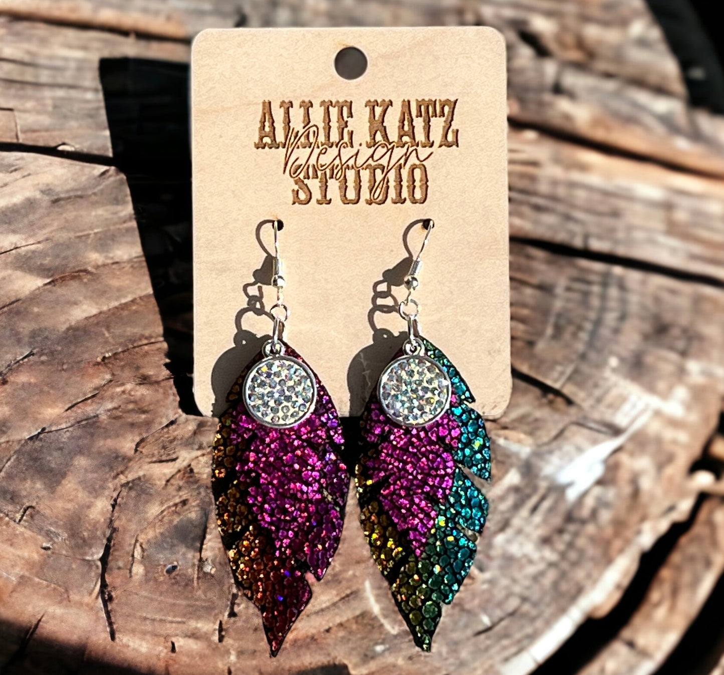 Metallic Leather feathered earrings w/rhinestone charm